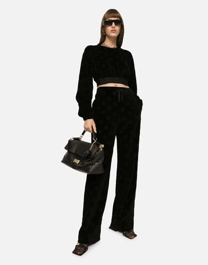 Dolce and Gabbana Trousers And Shorts Women Flocked Jersey Pants With Allover DG Logo Black Dolce and Gabbana Trousers And Shorts Women Flocked Jersey Pants With Allover DG Logo Black