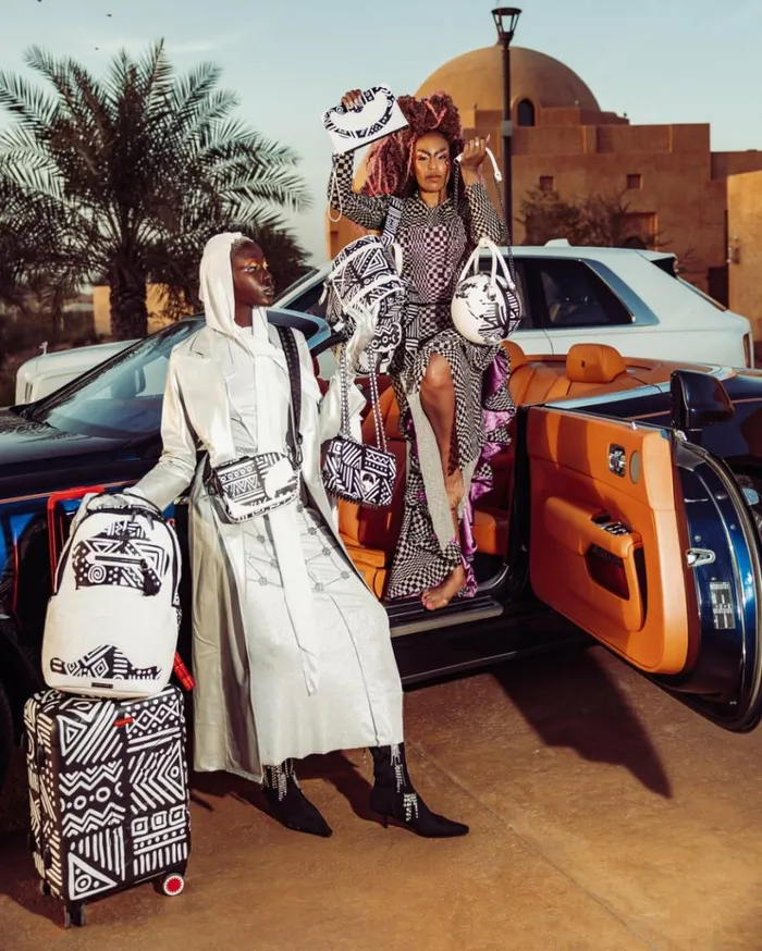 SPRAYGROUND AI8 AFRICAN INTELLIGENCE 8211 ORIGIN STORY CROSSOVER CLUTCH Bags
